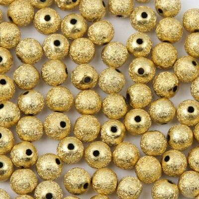 Lot de  30 perles Stardust dorées 4mm