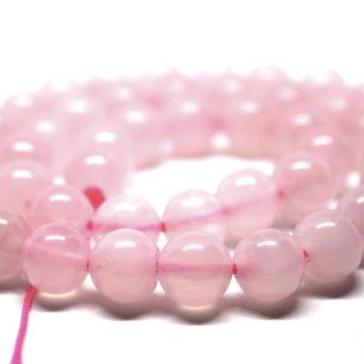 Lot d'environ 46 perles  Quartz rose 8mm sur fil