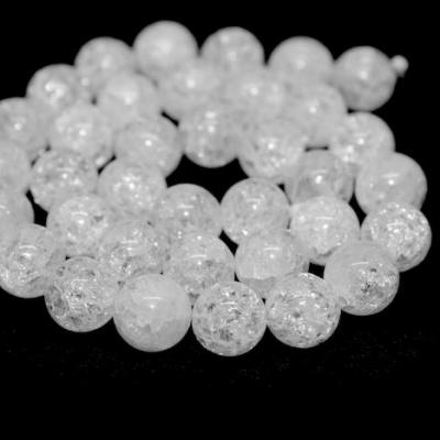 Fil de 36 perles en cristal de roche blanc givré 10mm